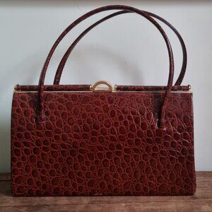 Brown leather clutch